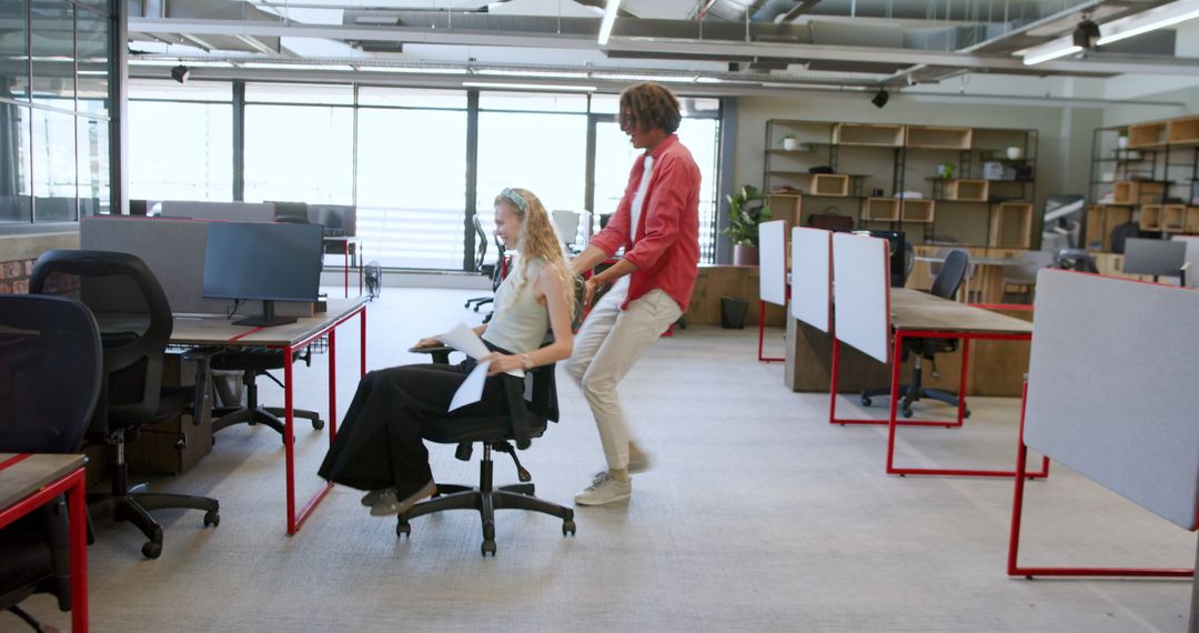 Team Having Fun in Modern Open Workspace Office