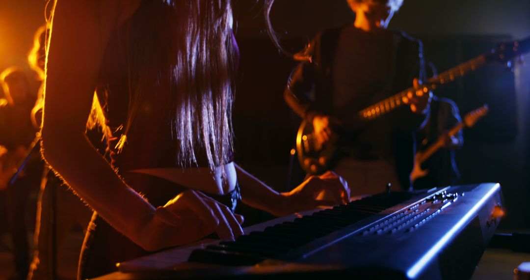 Band Jamming with Electric Piano in Recording Studio