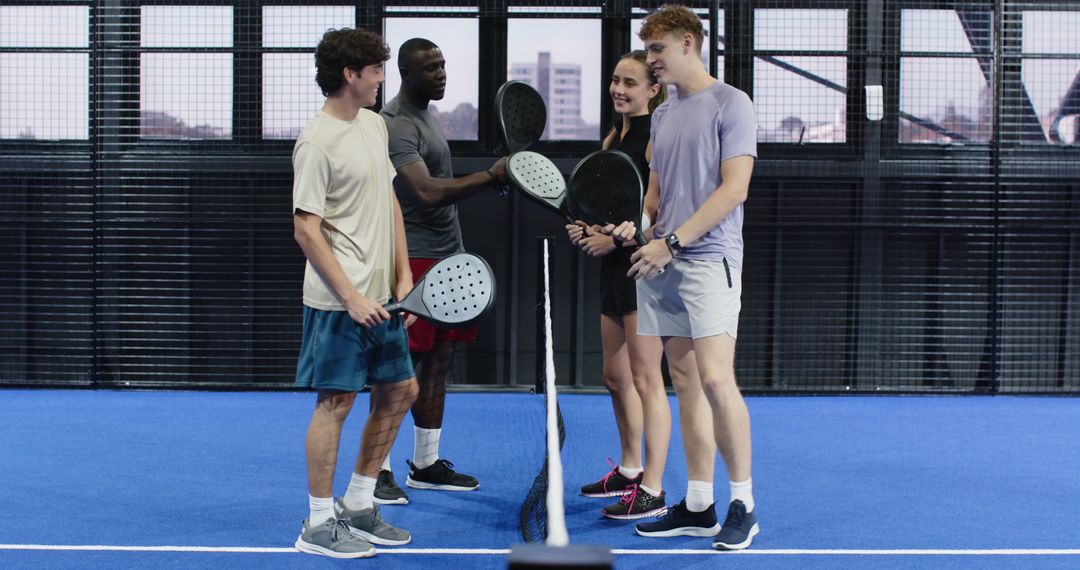 Diverse Group Enjoying Padel and Building Camaraderie