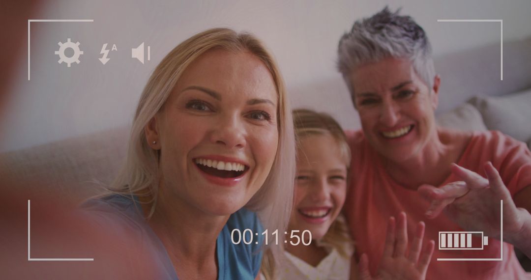 Three Generation Family Making Video Messages at Home