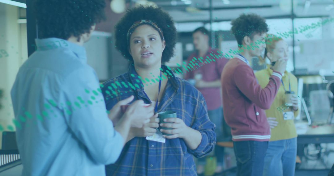 Diverse Team Collaborating in Modern Office Setting with Dynamic Data Overlay