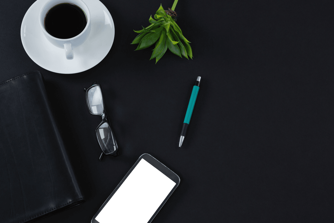 Transparent Office Desk Essentials with Coffee and Botanical Accent