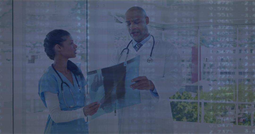 Doctor and Nurse Analyzing X-ray for Diagnosis