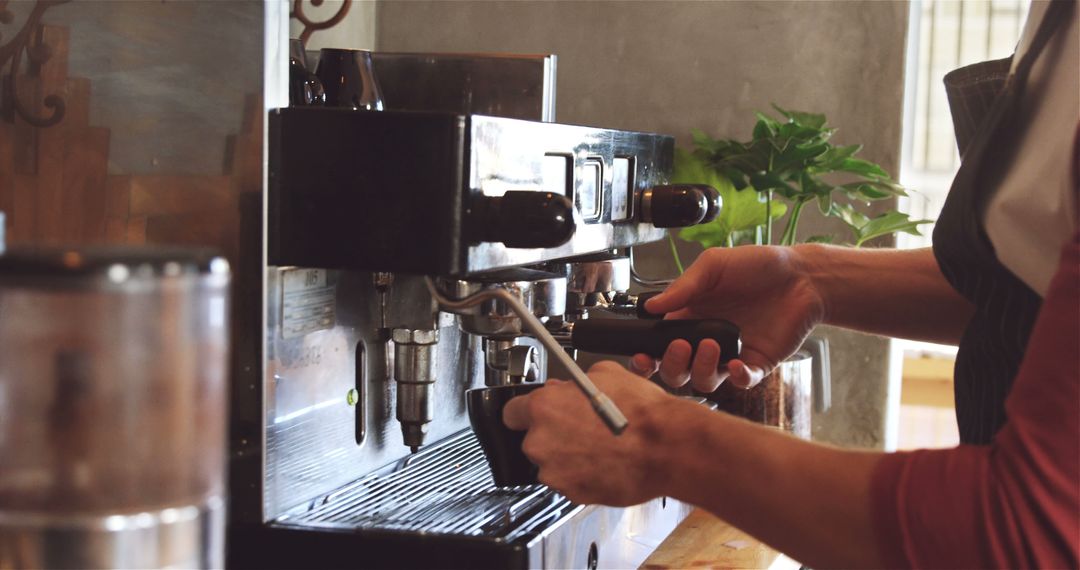 Barista Making Espresso Coffee in Modern Coffee Shop - Free Images, Stock Photos and Pictures on Pikwizard.com