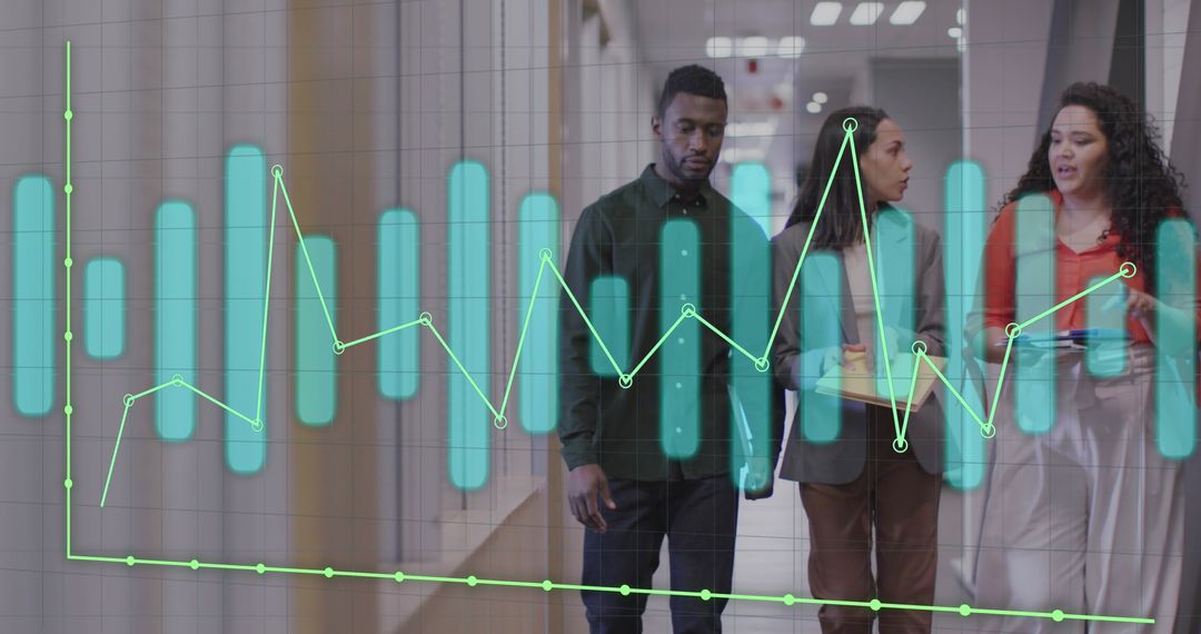 Colleagues Analyzing Graphs in Office Hallway