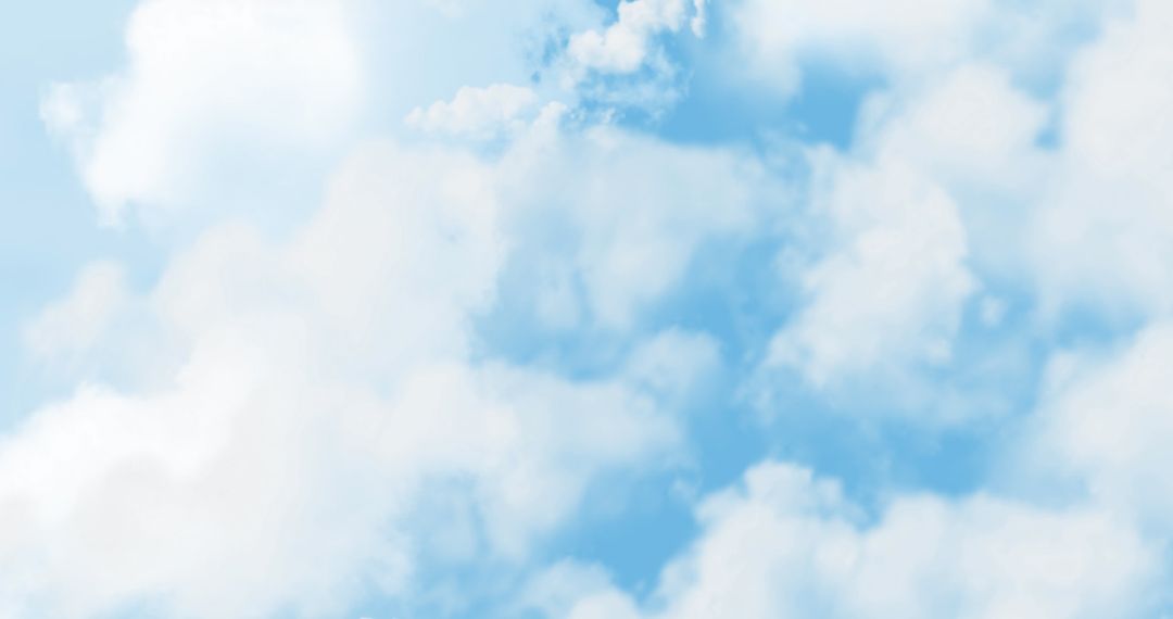 Fluffy White Clouds Against Vibrant Blue Sky