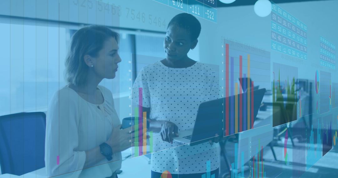 Colleagues Discussing Data Analytics with Overlaid Graphs in Modern Office