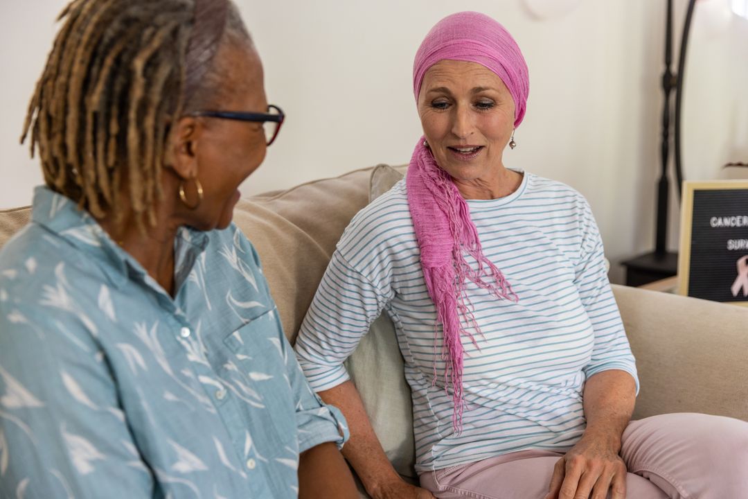 Two Senior Women Sharing Supportive Conversation at Home