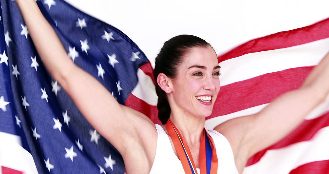 Happy athlete holding American flag on white screen - Free Images, Stock Photos and Pictures on Pikwizard.com