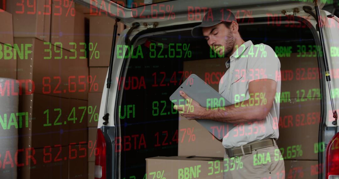 Delivery Driver Using Tablet Near Stock Market Data