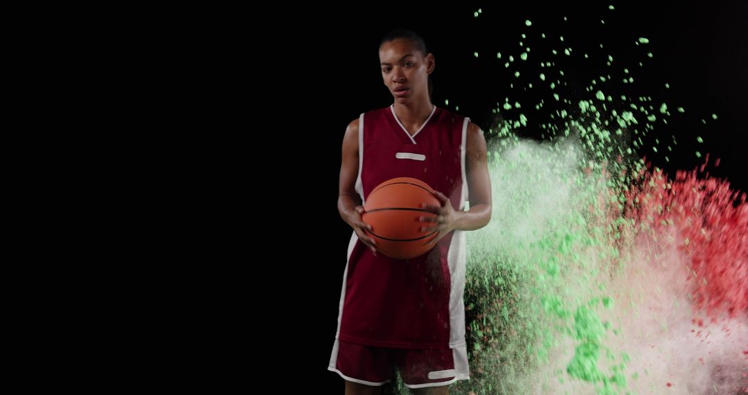 Dynamic Basketball Player with Colorful Powder Burst