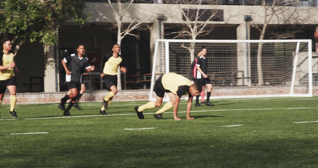 Youth Soccer Players Practicing Strategy on Sunny Field
