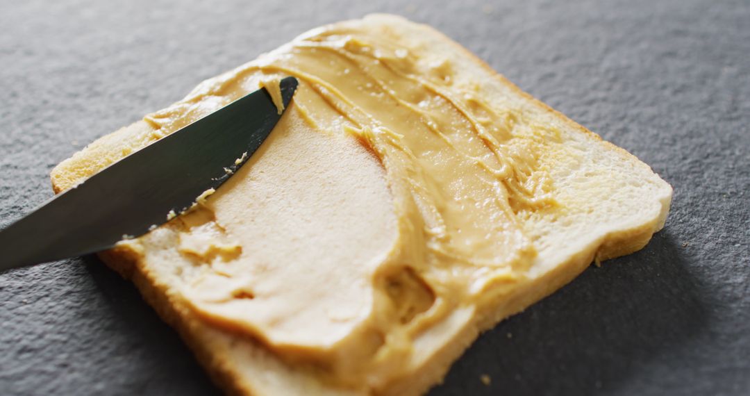 Close-Up of Peanut Butter Spread on Toast