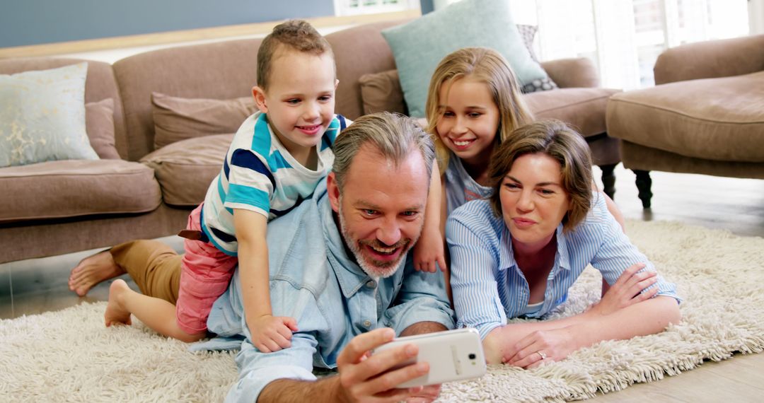 Happy Family Taking Selfie Together at Home - Free Images, Stock Photos and Pictures on Pikwizard.com