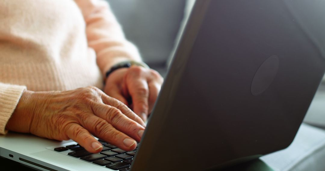 Senior Woman Typing on Laptop at Home - Free Images, Stock Photos and Pictures on Pikwizard.com