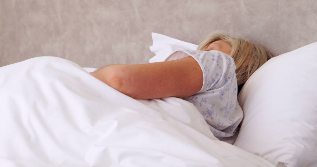 Woman Sleeping Peacefully in Bed with White Sheets - Free Images, Stock Photos and Pictures on Pikwizard.com