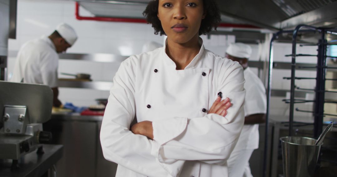 Portrait of african american female chef with arms crossed looking at camera - Free Images, Stock Photos and Pictures on Pikwizard.com