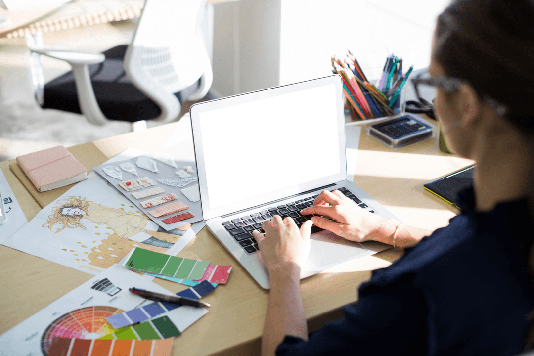 Transparent Laptop with Fashion Designer at Work in Modern Office