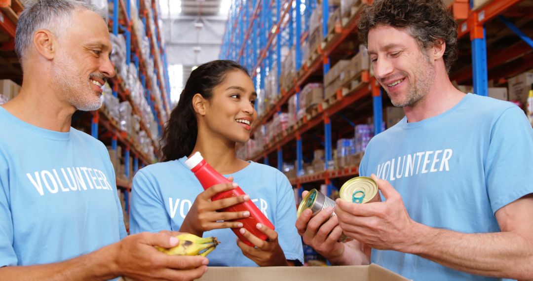 Volunteers Sorting Donations in Warehouse - Free Images, Stock Photos and Pictures on Pikwizard.com