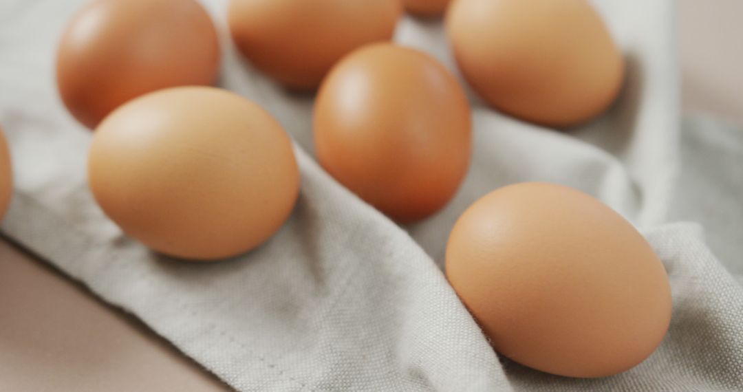 Brown Eggs on Linen Cloth for Food Preparation - Free Images, Stock Photos and Pictures on Pikwizard.com