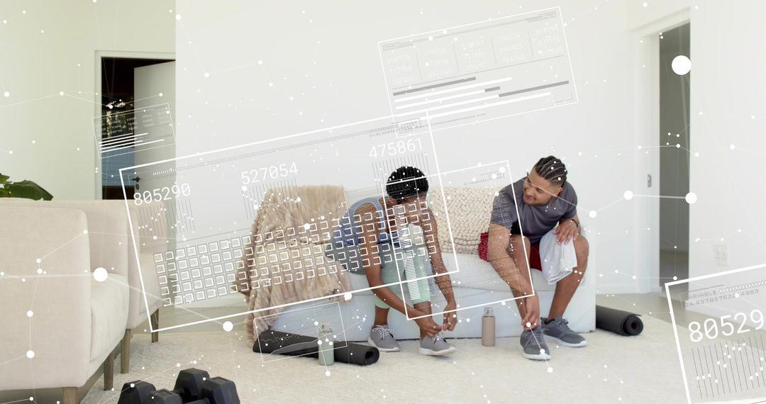 Couple tying sneakers before home workout in contemporary living room with fitness gear