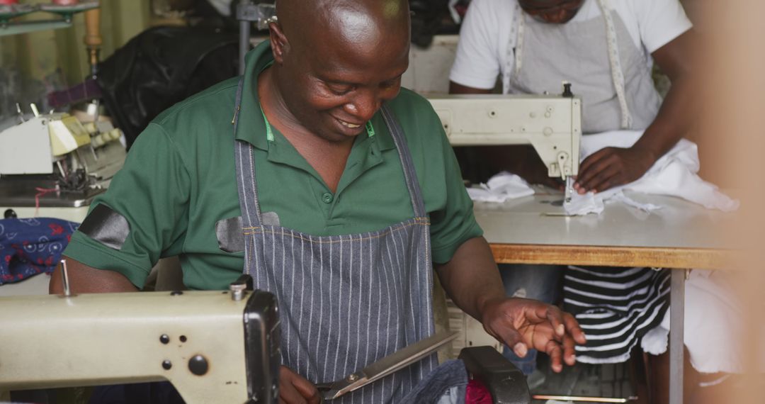 African Men Sewing Fabrics in Tailor Shop - Free Images, Stock Photos and Pictures on Pikwizard.com