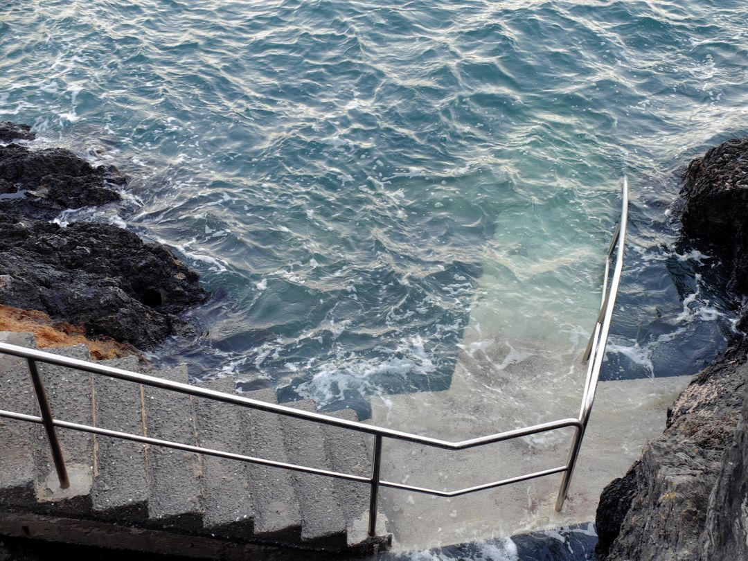 Staircase Leading into Crystal Blue Ocean Water - Free Images, Stock Photos and Pictures on Pikwizard.com