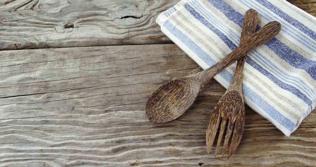 Rustic Wooden Spoon and Fork Set on Wooden Plank Table - Free Images, Stock Photos and Pictures on Pikwizard.com