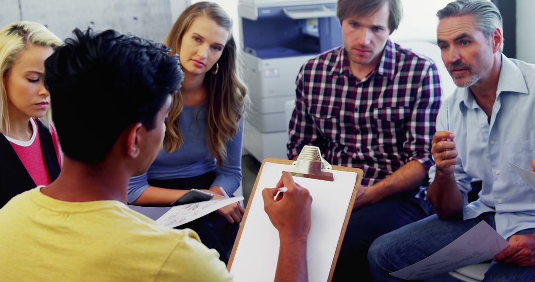 Collaborative Strategy Planning Among Diverse Group in Modern Office