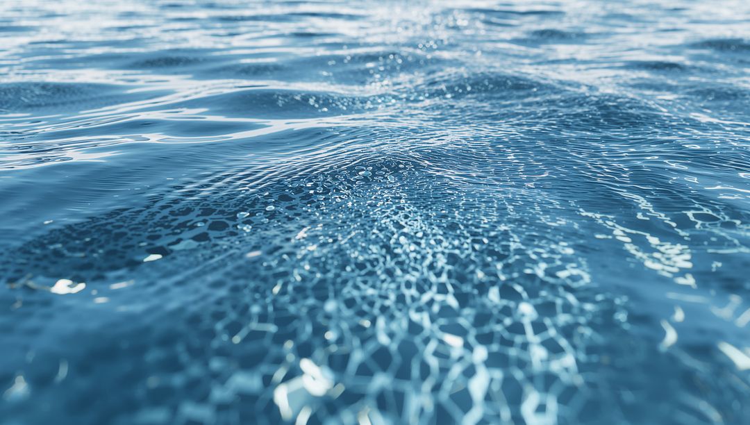 Glittering Sunlit Ocean Surface Showing Ripples and Caustic Light Patterns