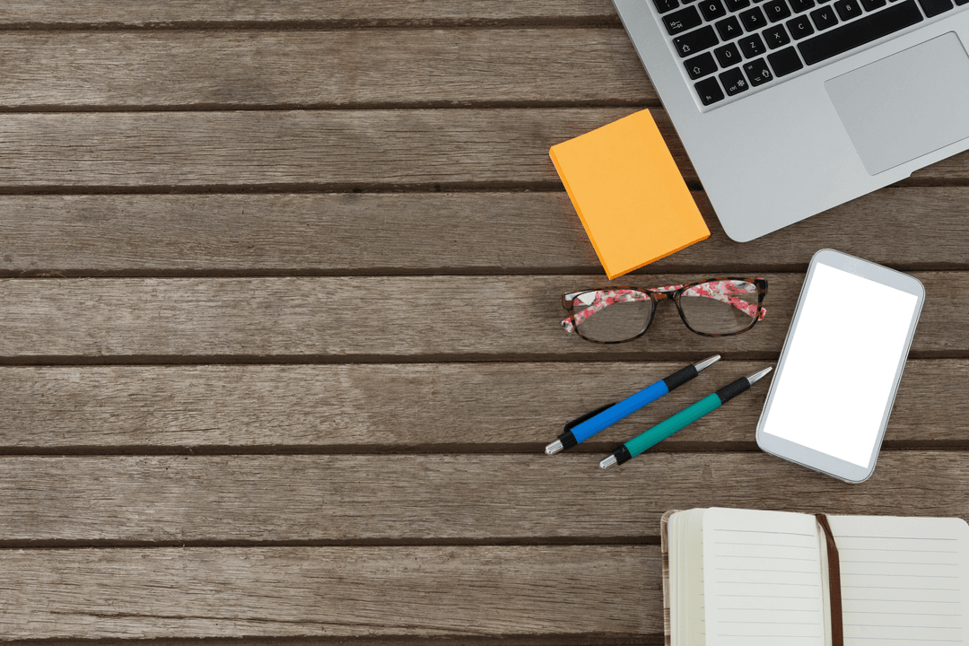 Stylish Workspace with Transparent Mobile and Stationery