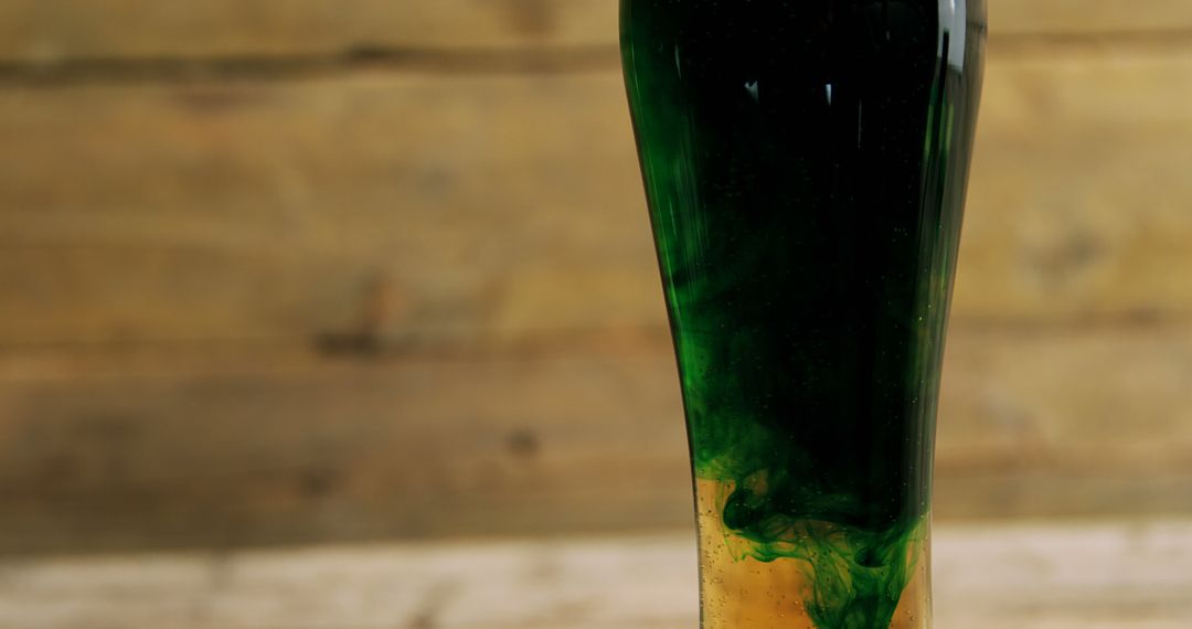 Close-Up of Beer with Green Dye for St. Patrick's Day Celebration - Free Images, Stock Photos and Pictures on Pikwizard.com