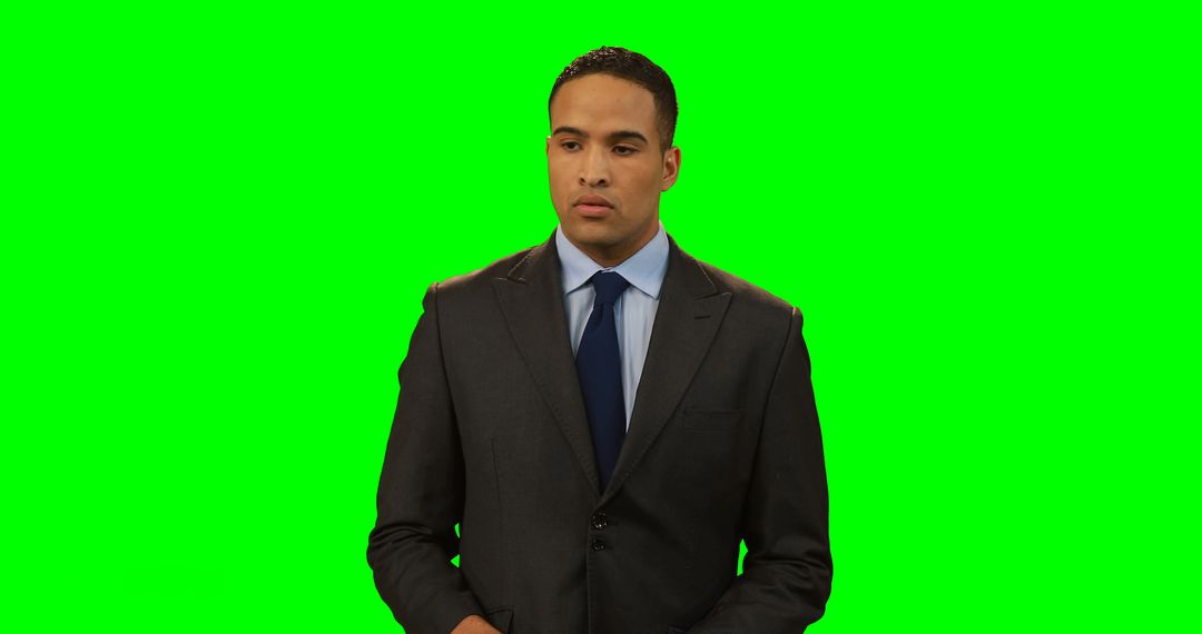 Businessman touching invisible screen against green screen - Free Images, Stock Photos and Pictures on Pikwizard.com