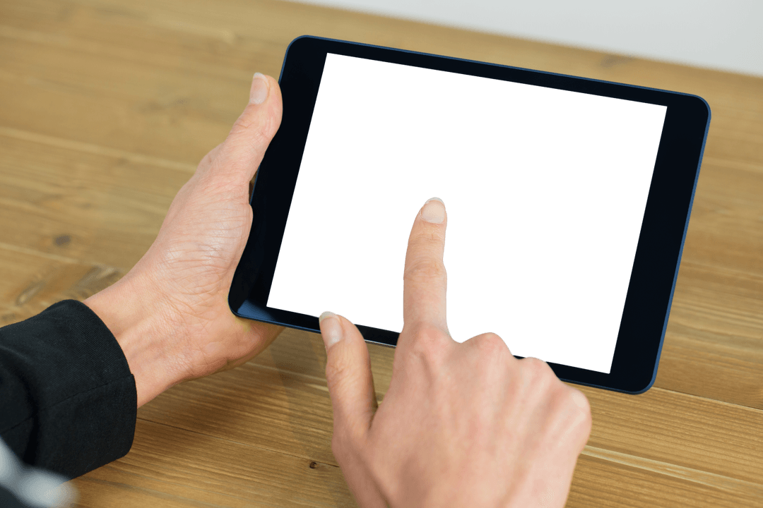 Businesswoman Using Transparent Tablet at Wooden Desk