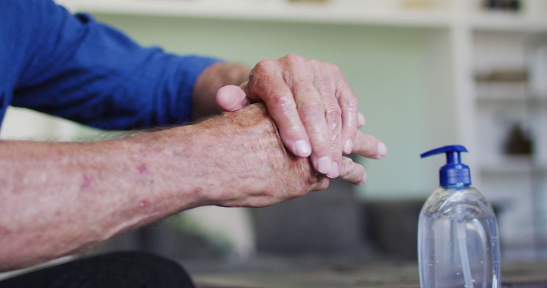 Close-Up of Elderly Hands Using Hand Sanitizer - Free Images, Stock Photos and Pictures on Pikwizard.com