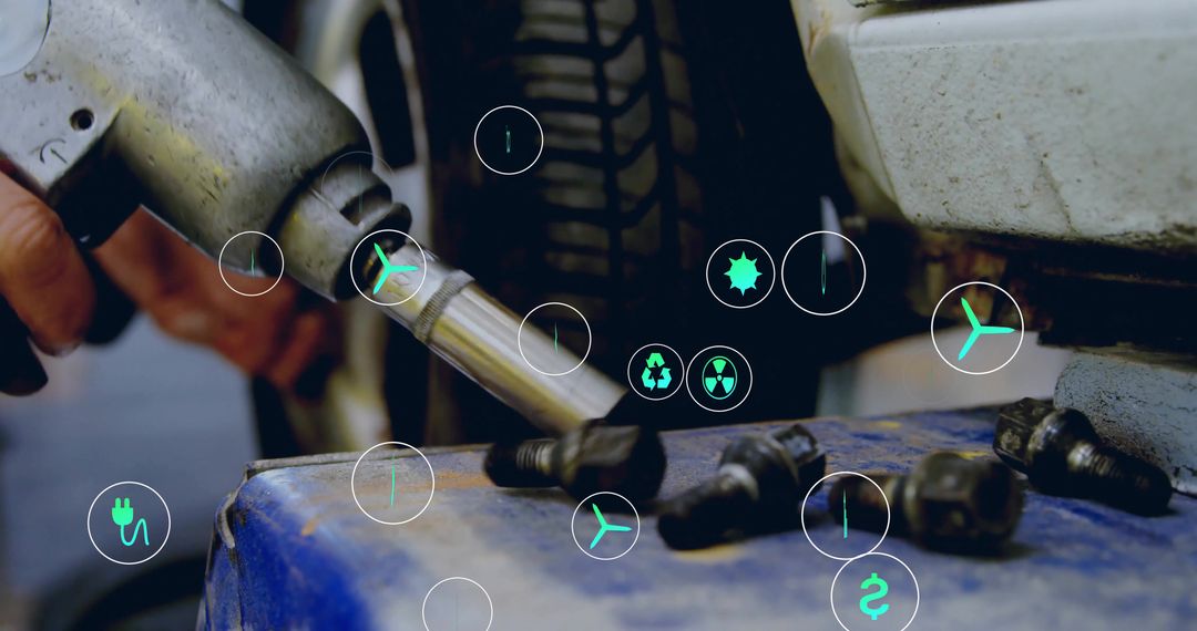 Car Mechanic Working with Energy Concept Icons in Workshop