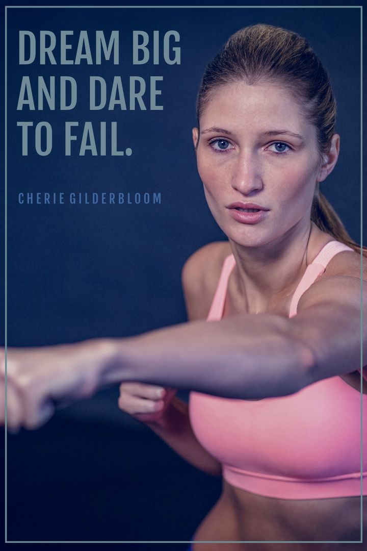 Focused Female Athlete with Motivational Quote Embracing Determination - Download Free Stock Templates Pikwizard.com