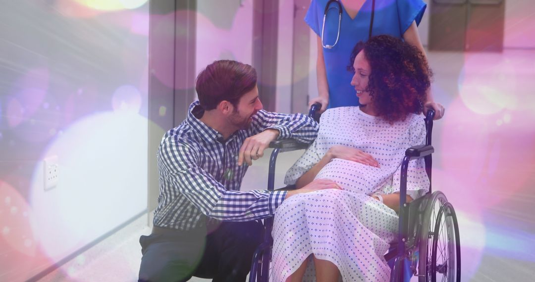 Biracial Pregnant Woman with Husband and Nurse in Hospital - Free Images, Stock Photos and Pictures on Pikwizard.com