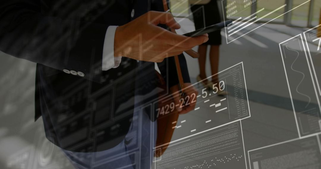 Business Executive Using Tablet with Digital Data Interfaces in Office