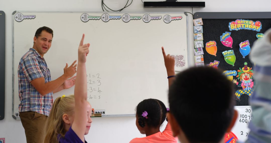 Teacher Engaging Students in Classroom with Interactive Lesson