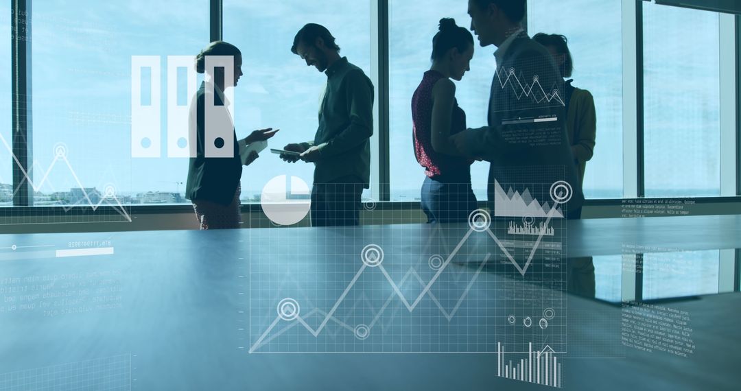 Diverse Team Collaborating with Digital Data Analysis in Modern Office