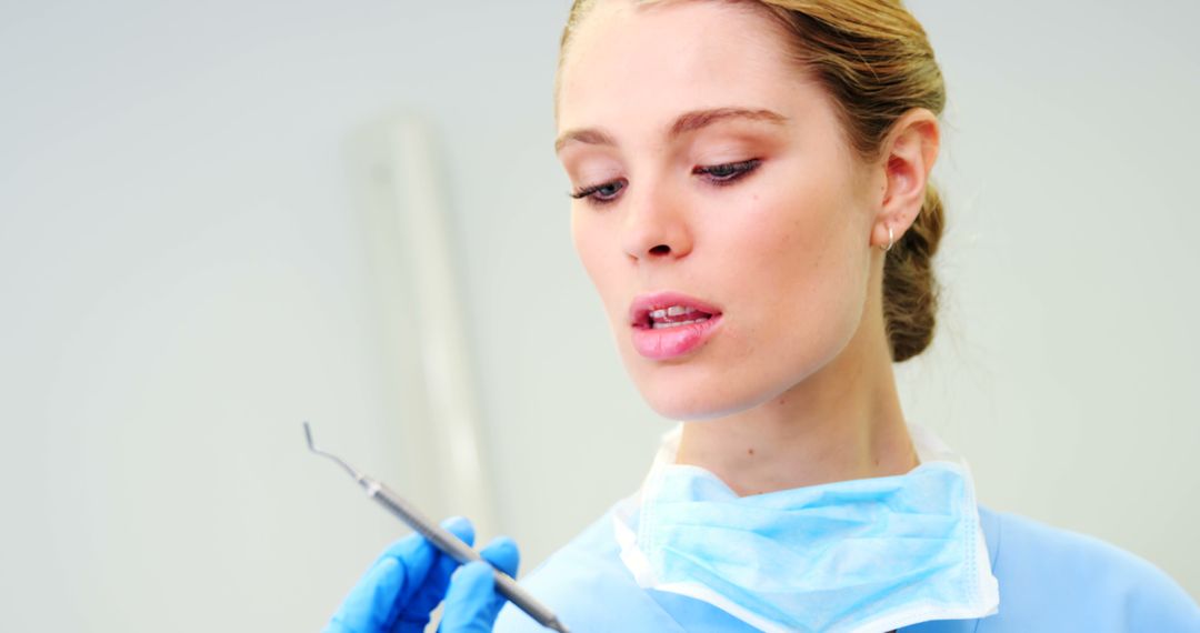 Young Female Dentist with Medical Tools - Free Images, Stock Photos and Pictures on Pikwizard.com