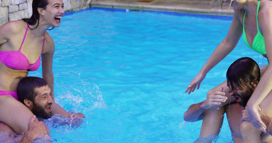 Group of Friends Playfully Enjoying a Swimming Pool on a Summer Day - Free Images, Stock Photos and Pictures on Pikwizard.com