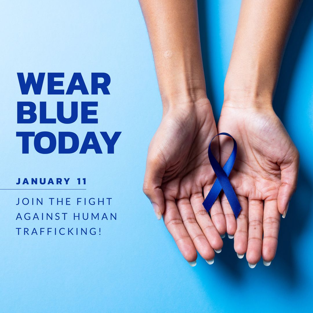 Hands Holding Blue Ribbon Raising Awareness About Human Trafficking