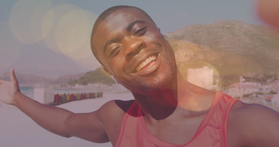 Joyful African American Man Smiling at Sunny Beach