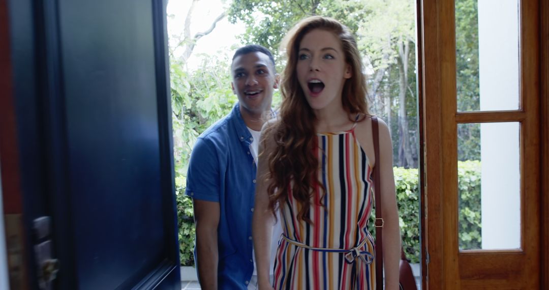 Excited Couple Entering New Home, Embracing Fresh Beginnings with Joy