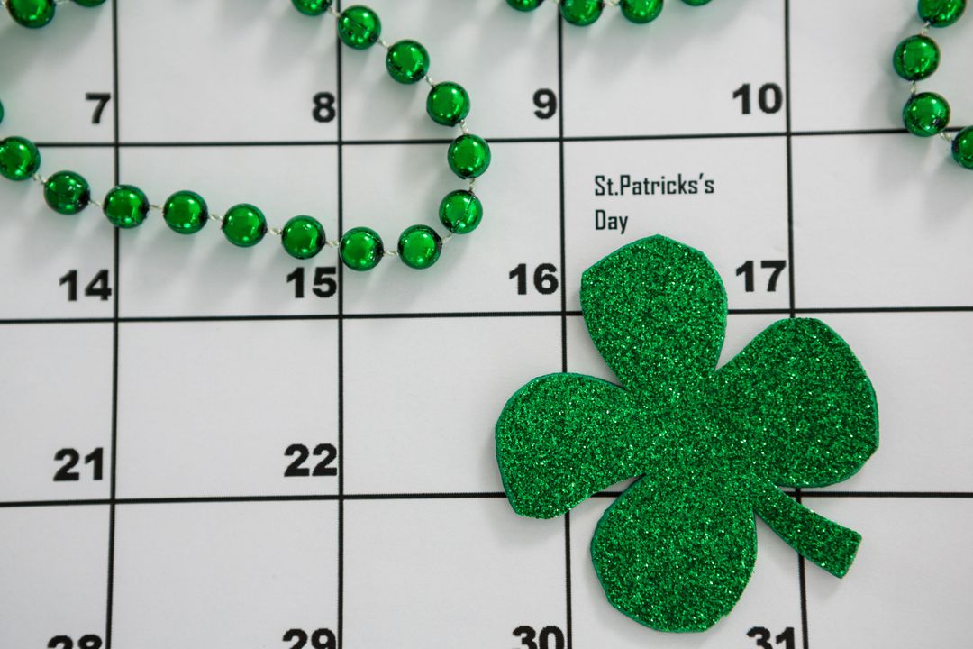 St. Patrick's Day Shamrock and Beads on Calendar - Free Images, Stock Photos and Pictures on Pikwizard.com