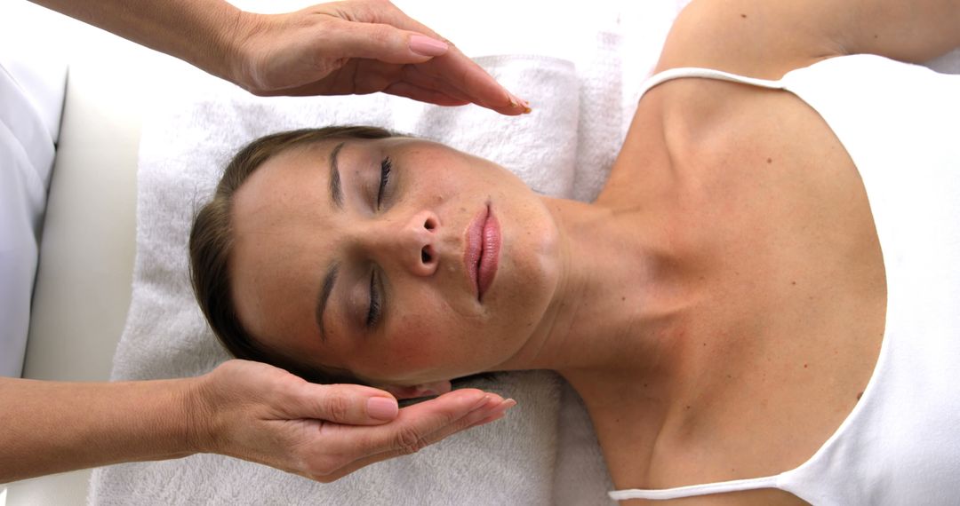 Relaxed Woman Receiving Rejuvenating Facial Treatment - Free Images, Stock Photos and Pictures on Pikwizard.com