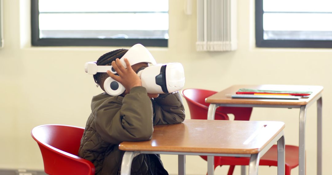 Young Student Experiencing Virtual Reality in Classroom Setting