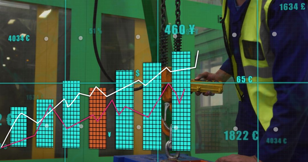 Factory Worker Using Pendant Control with Overlay Digital Charts